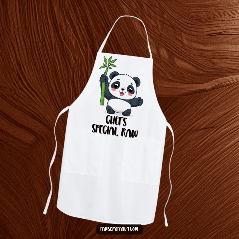 Funny chef apron featuring a panda character triumphantly holding bamboo, perfect for humorous kitchen adventures and protecting clothes.