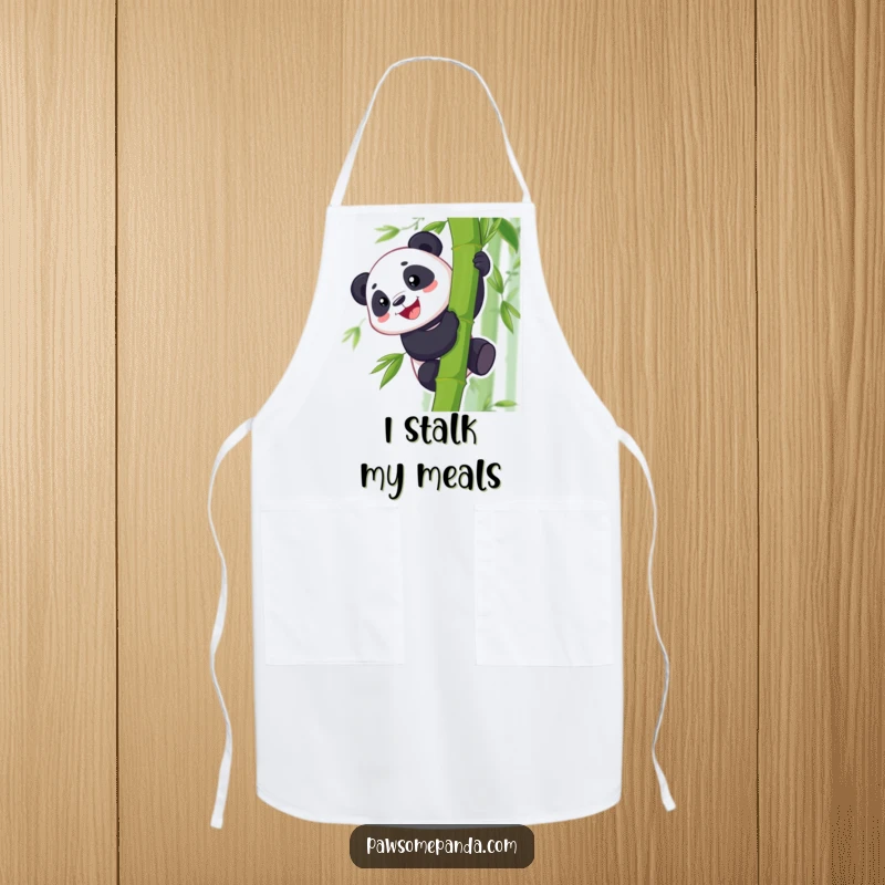 Funny apron showing a grinning panda character climbing a bamboo stalk, adding a humorous touch to cooking and baking.