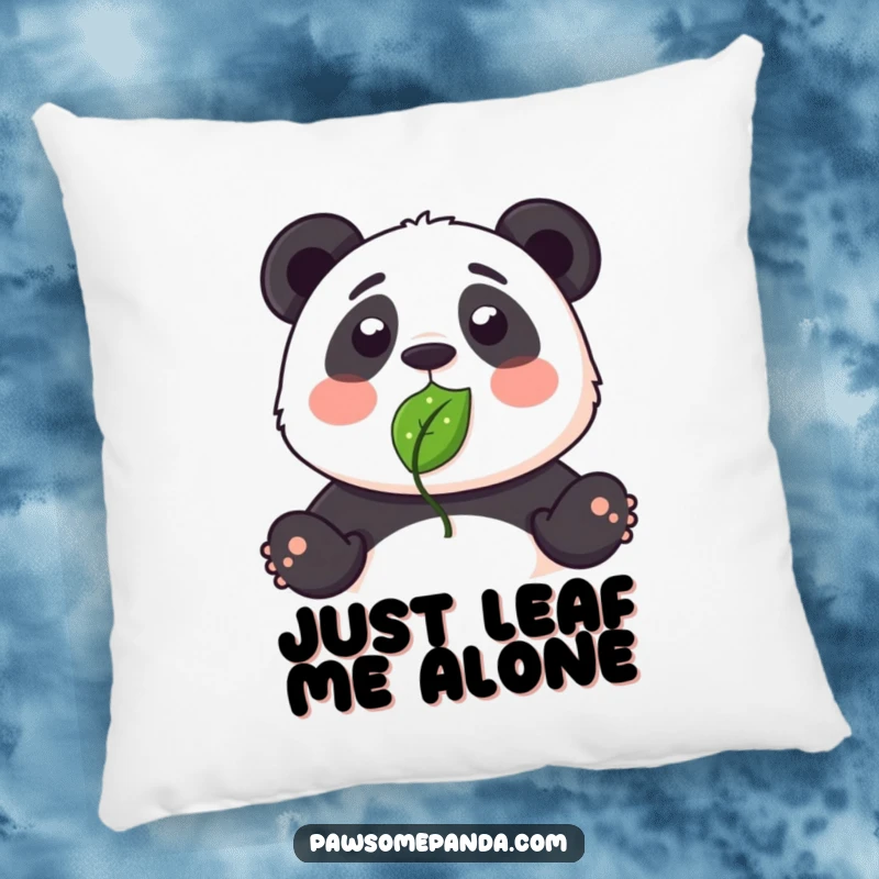 Funny pillow featuring a plush panda looking surprised and slightly embarrassed by a leaf on its nose.