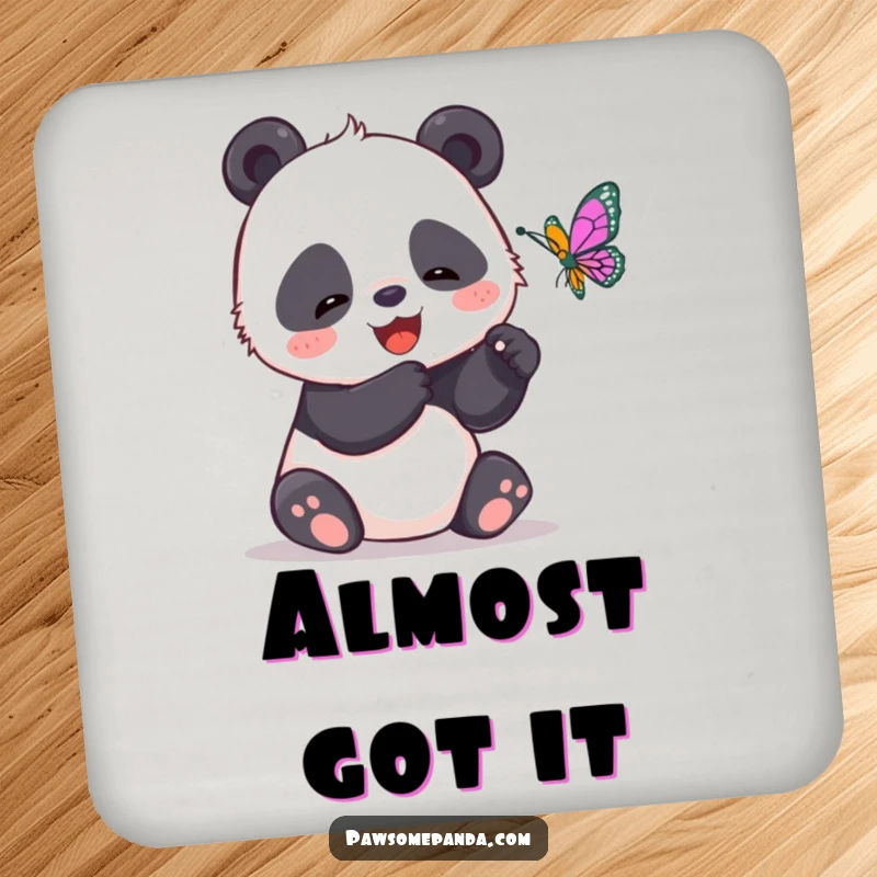 Funny drink coaster featuring a giggling panda attempting to catch a butterfly, adding playful humor to any surface.