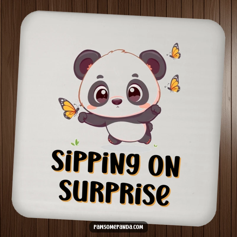 Funny kawaii panda cub with wide, surprised eyes, chasing a butterfly, on a drink coaster, adding cute humor.
