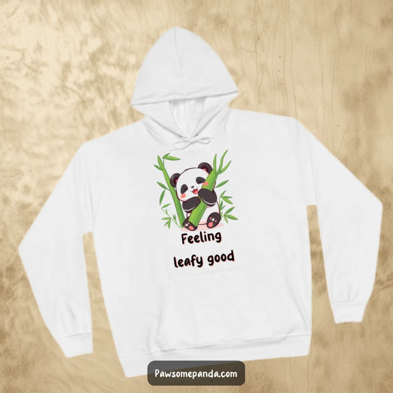 Funny Hoodie: A happy panda character joyfully hugs a giant bamboo leaf, radiating hilarious happiness.