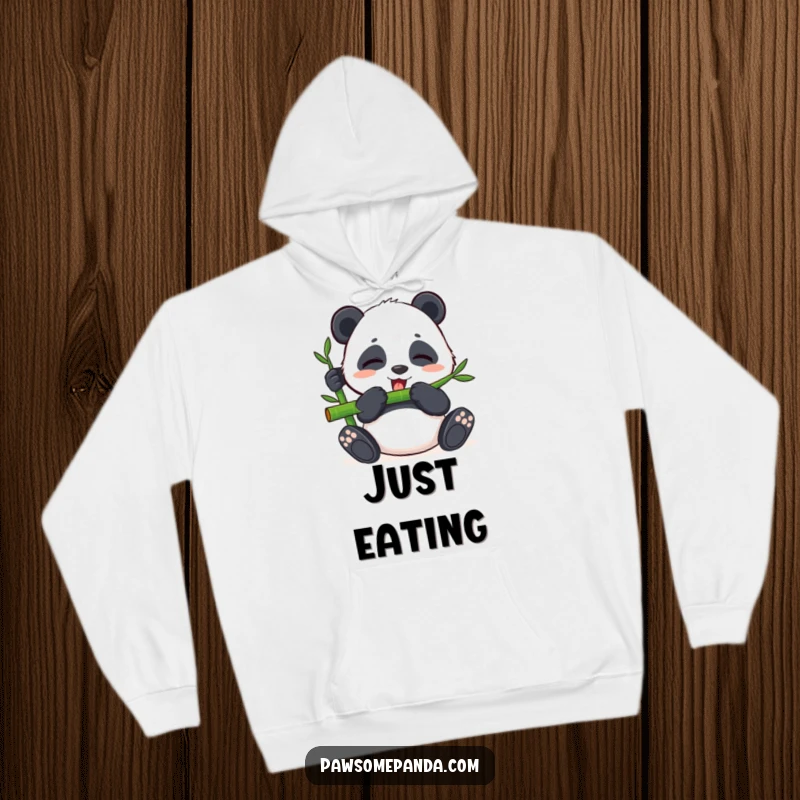 Funny hoodie showcasing a content panda happily munching on bamboo with closed eyes, exuding peaceful vibes.