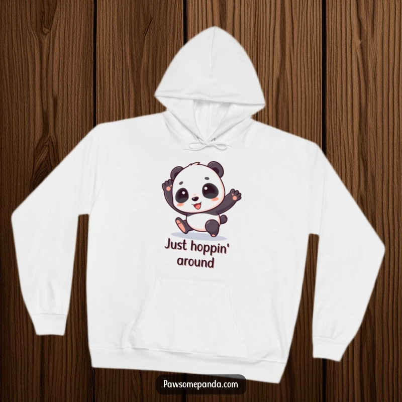 Funny hoodie featuring a cute panda character doing a happy hop, perfect for cozy days and spreading smiles.