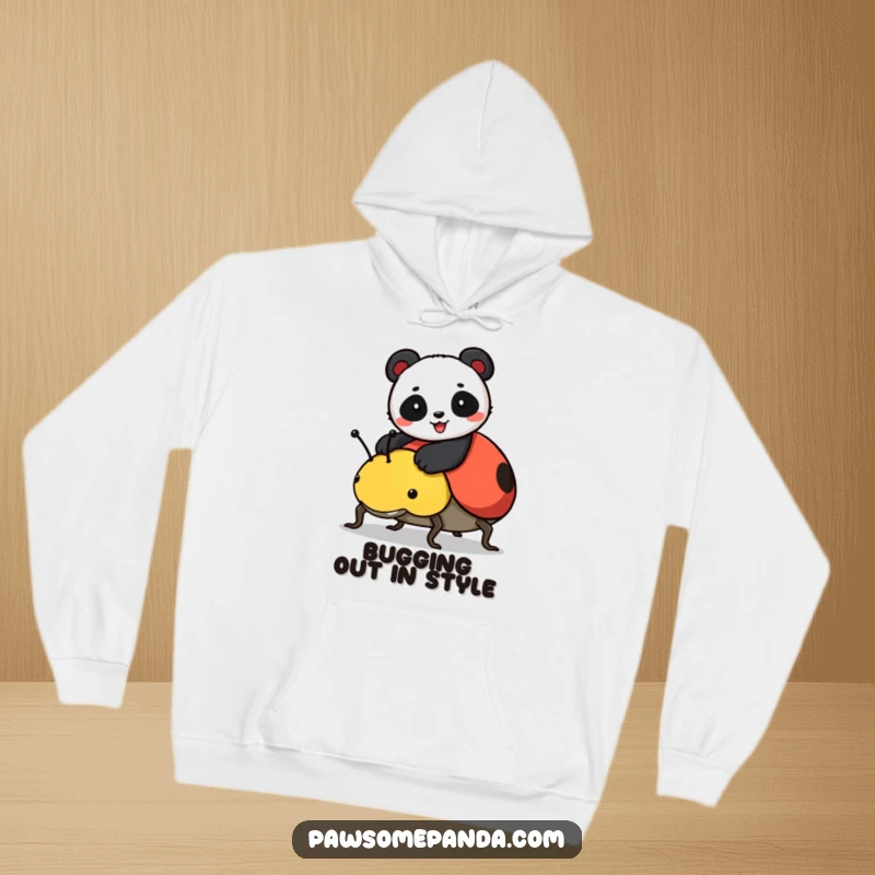 Funny hoodie showcasing a happy panda enjoying a ladybug ride, a delightful scene of joy and companionship.