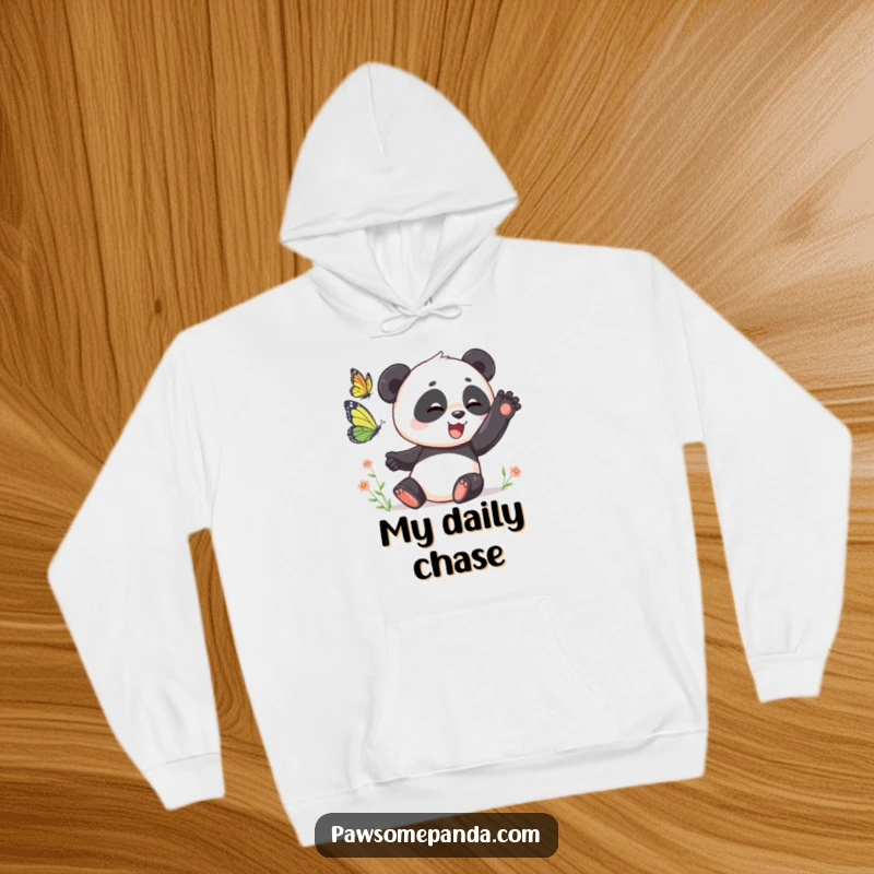 Funny Hoodie: A playful panda swatting at a butterfly, offering cozy comfort and hilarious action, an ideal funny gift.