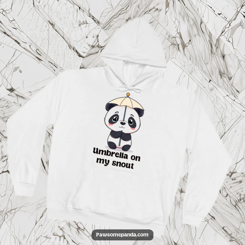 Funny hoodie featuring a determined little panda with exceptional focus, balancing a tiny umbrella on its nose with great care.