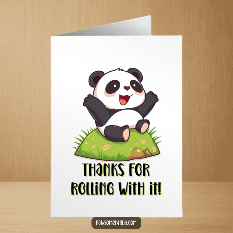 Funny free printable thank you card: a happy panda with a wide grin rolls down a grassy hill, conveying heartfelt thanks.