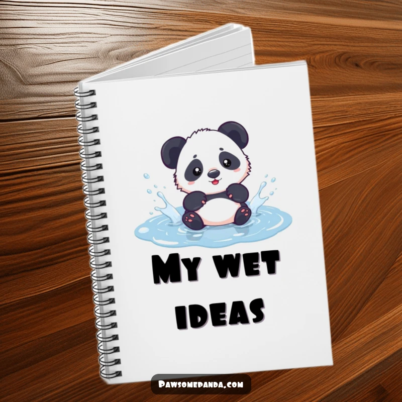 Funny kawaii panda cub playfully splashing in a puddle, featured on a notebook cover, encouraging playful writing.