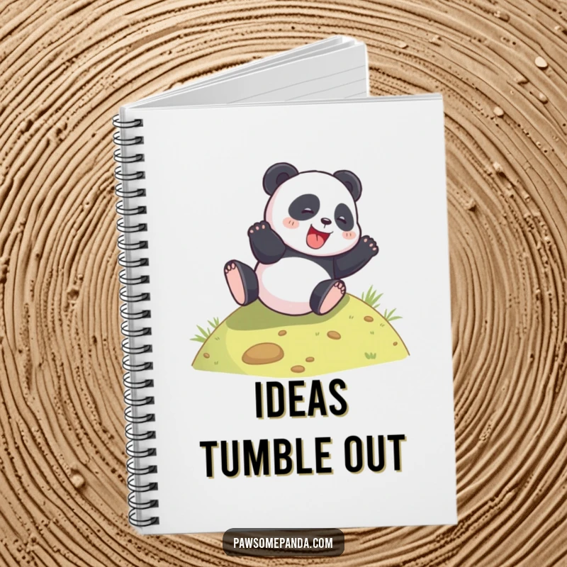 Funny panda rolling down a hill on a notebook cover, perfect for journaling joy.