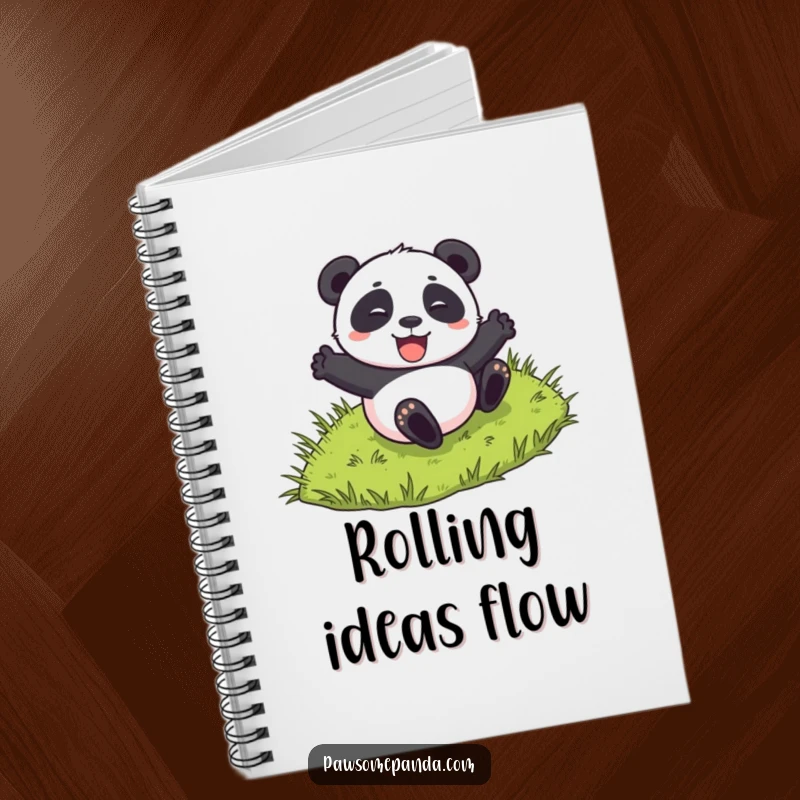Funny notebook cover featuring a panda character excitedly rolling down a grassy hill, ideal for jotting down playful thoughts.