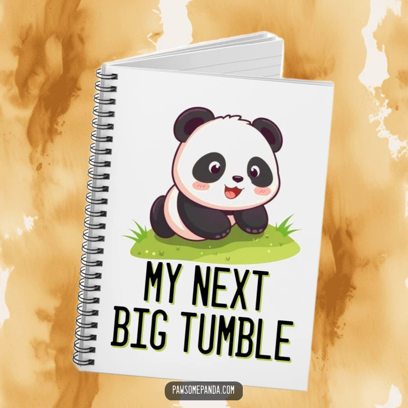 Funny kawaii panda cub happily rolling down a grassy hill, featured on a notebook cover, inspiring joyous note-taking and creativity.