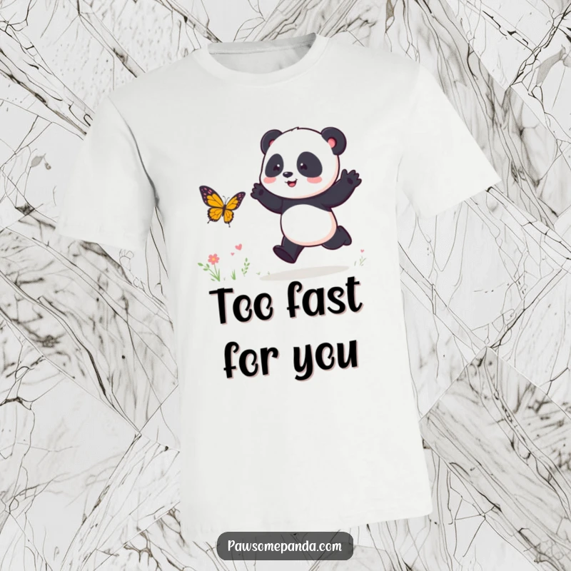 Funny T-Shirt: A cute panda character energetically hops, playfully chasing a colorful butterfly in a spirited outdoor scene.