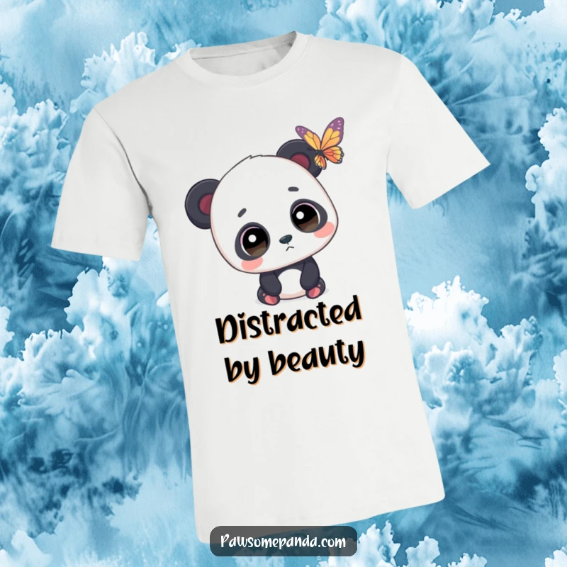 Funny t-shirt showing a panda with expressive, wide eyes captivated by a delicate butterfly, embodying pure fascination.
