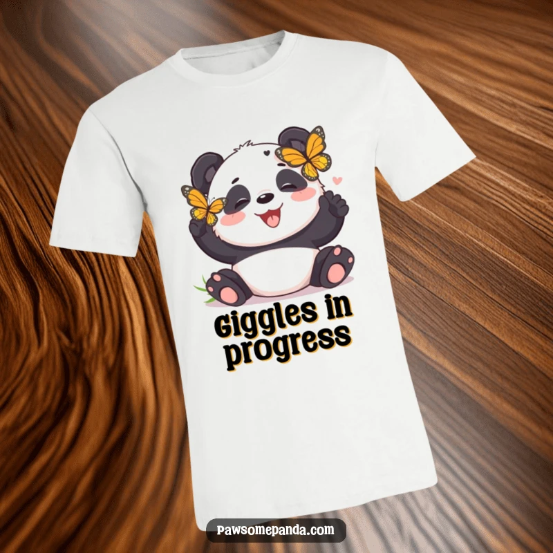 Funny panda t-shirt showcasing a happy panda bear giggling with delight while a butterfly tickles its face, pure amusement.