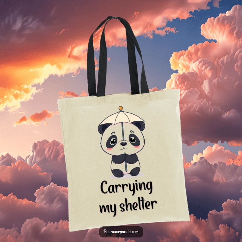 Funny tote bag showing a determined panda balancing a small umbrella on its nose, perfect for carrying daily necessities.